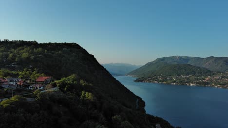 aerial over scenic hill overlooking lake orta