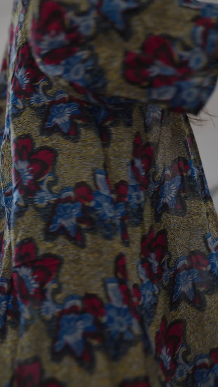 Woman Dancing in a Floral Kimono and Jeans