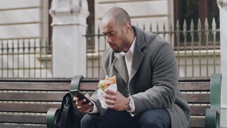 young professional eating a meal on lunch break