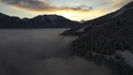 sea of clouds during a morning sunrise in the french alpes