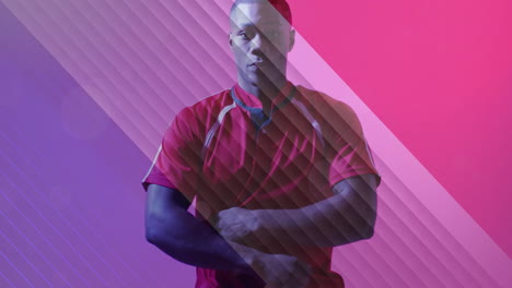 animation of flag of france over african american male rugby player