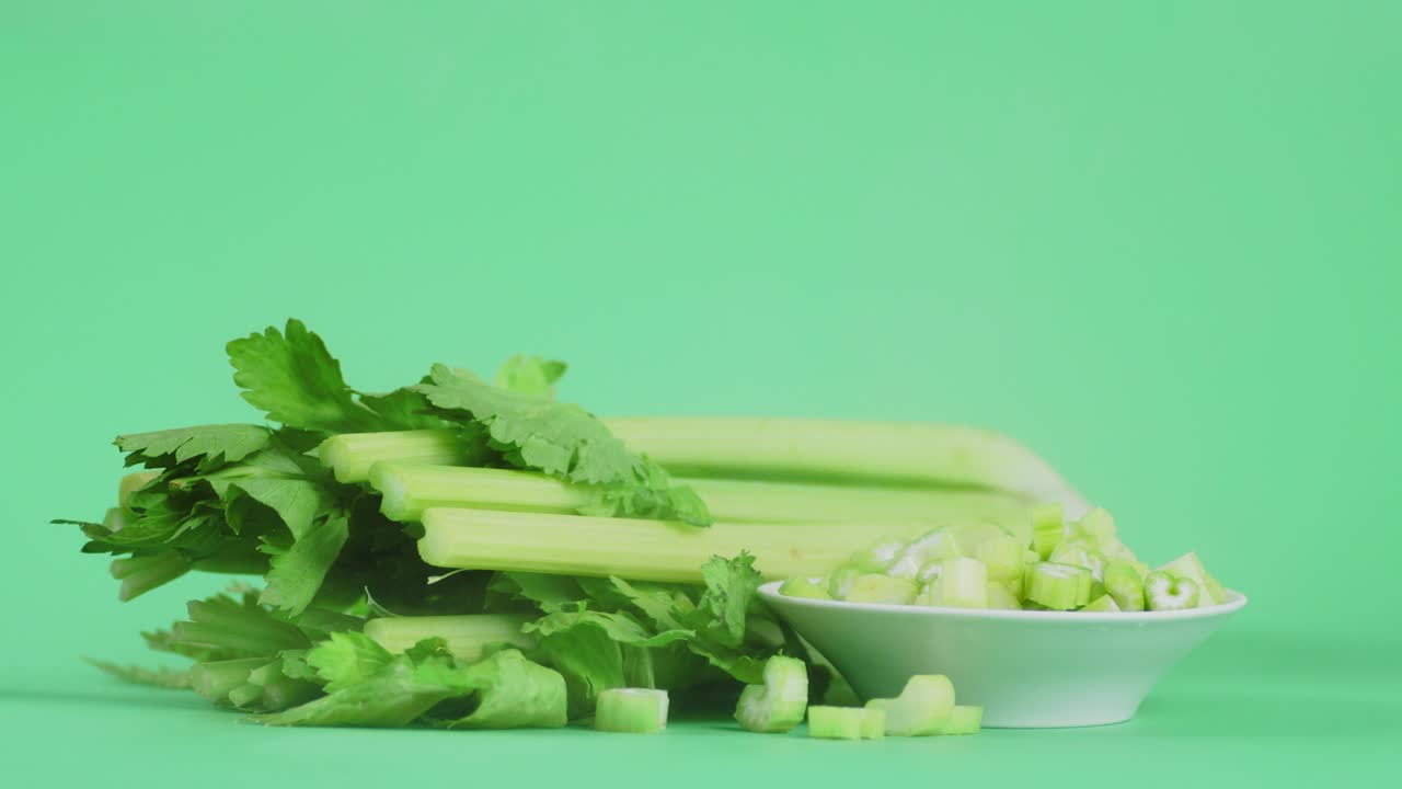 Fresh green celery with cool steam.