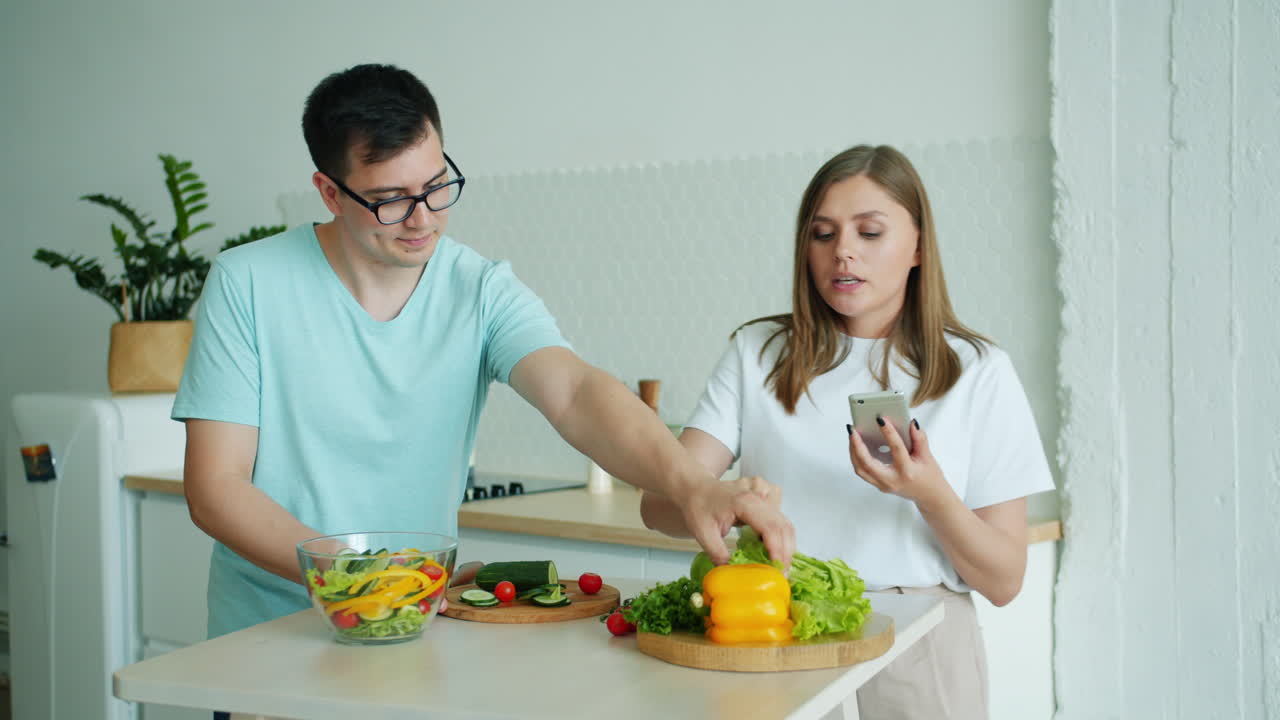 Couple preparing a healthy salad together