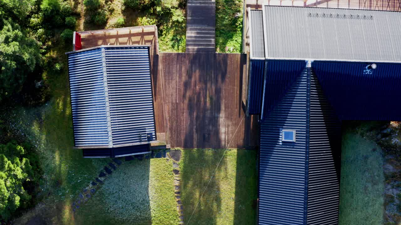 Roof Exterior Of Cabin Surrounded By Green Trees