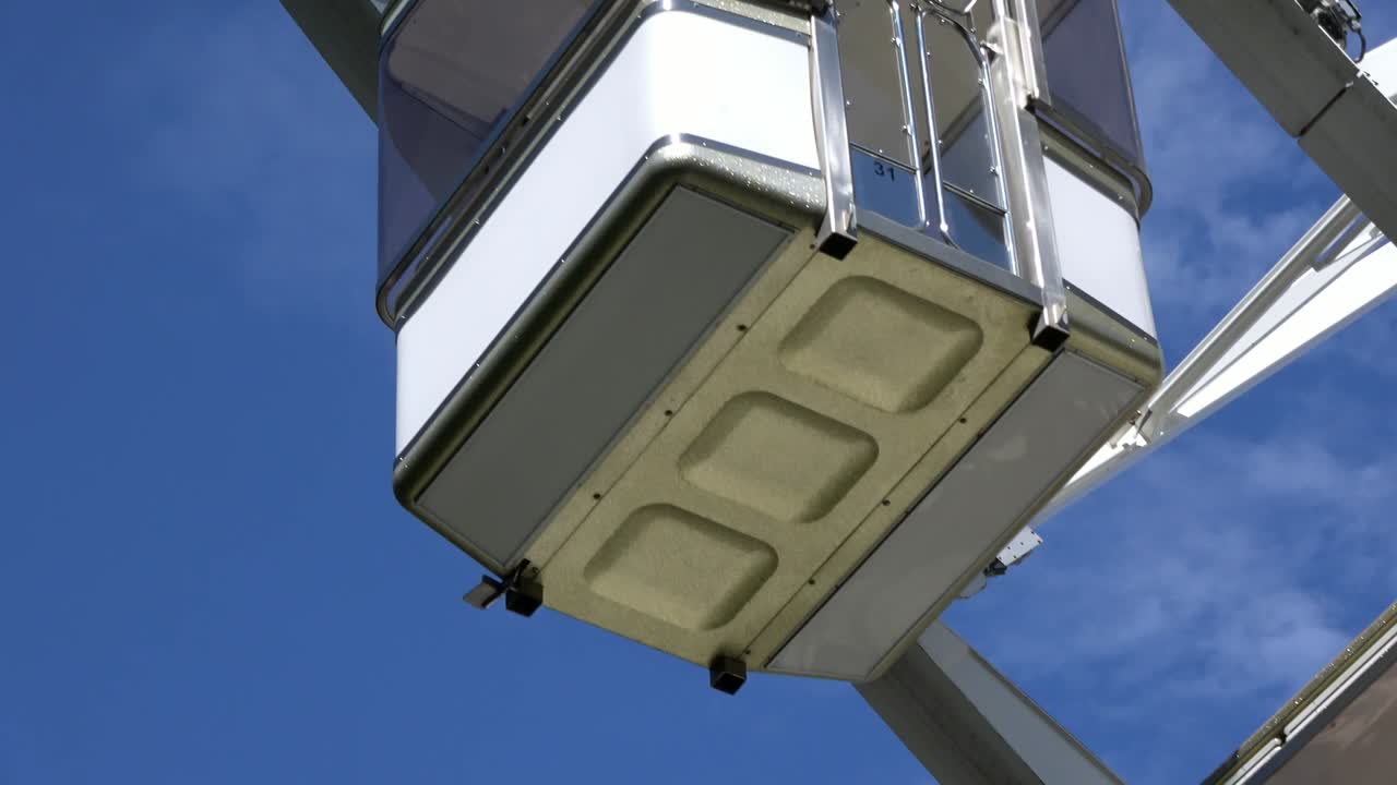 4K. Cabins of ferris wheel or big wheel that is spinning. Budapest Eye