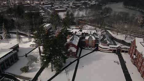 bird's eye view of bishop's university mcgreer hall with lake massawippi in background