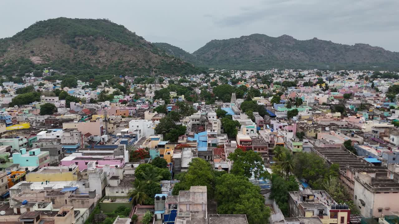 Aerial view of a town with mountains