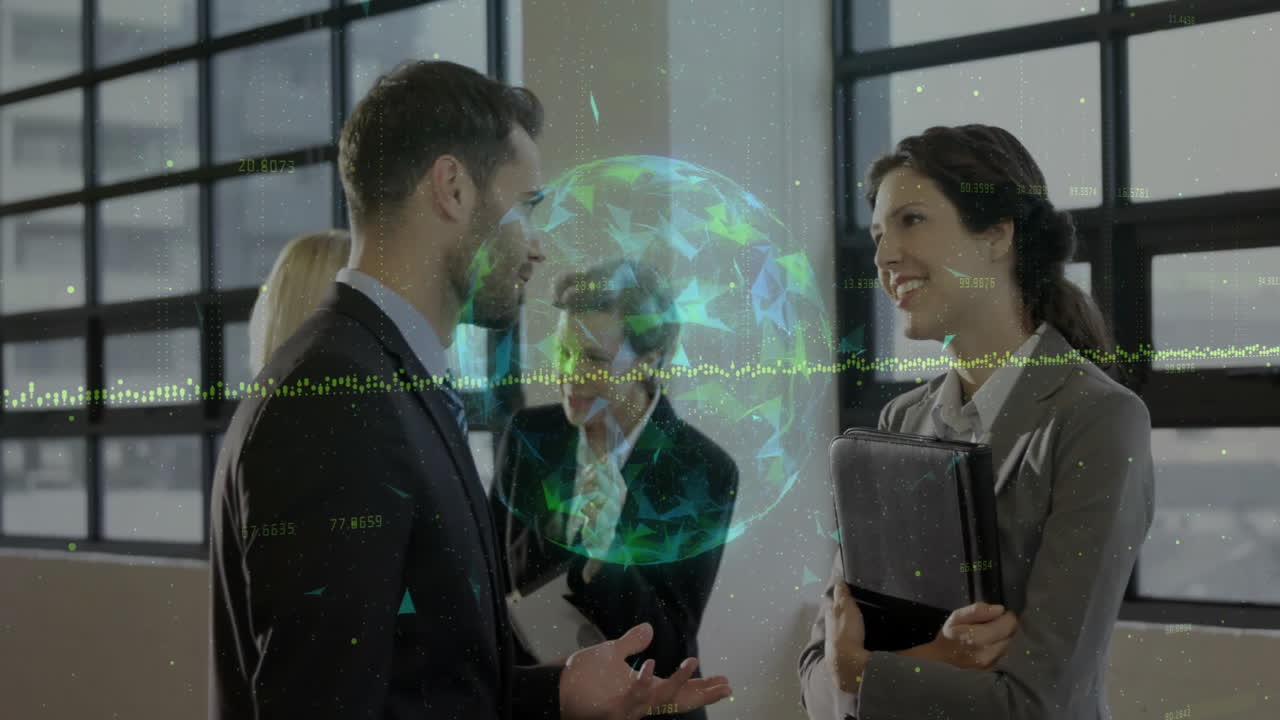 Business team discussing technology in office, showing holographic globe with data overlays