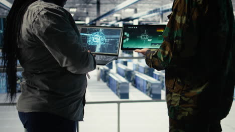 close up of army general and coworker in data center integrating ai into radar