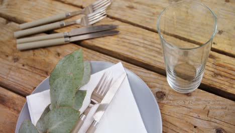 Various-cutlery-on-wooden-table-4k