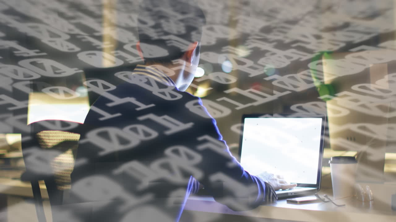 노트북과 스마트폰을 사용하는 소년의 뒤쪽 시야에 대한 바이너리 코딩 데이터 처리