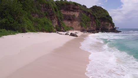 Drone-shot-of-Pantai-Mbawana-with-no-people-during-cloudy-day,-aerial