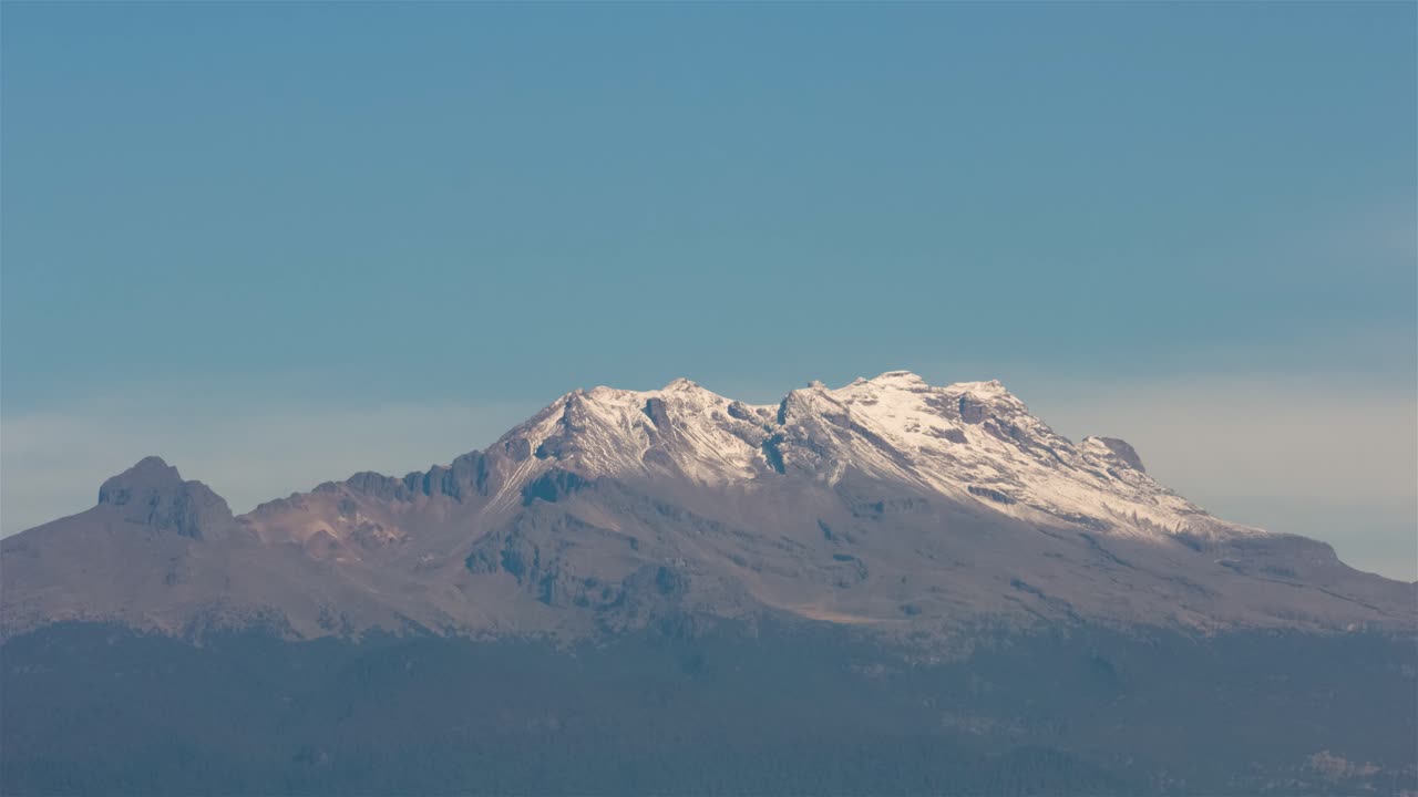 Top of Iztaccihuatl volcano covered with snow