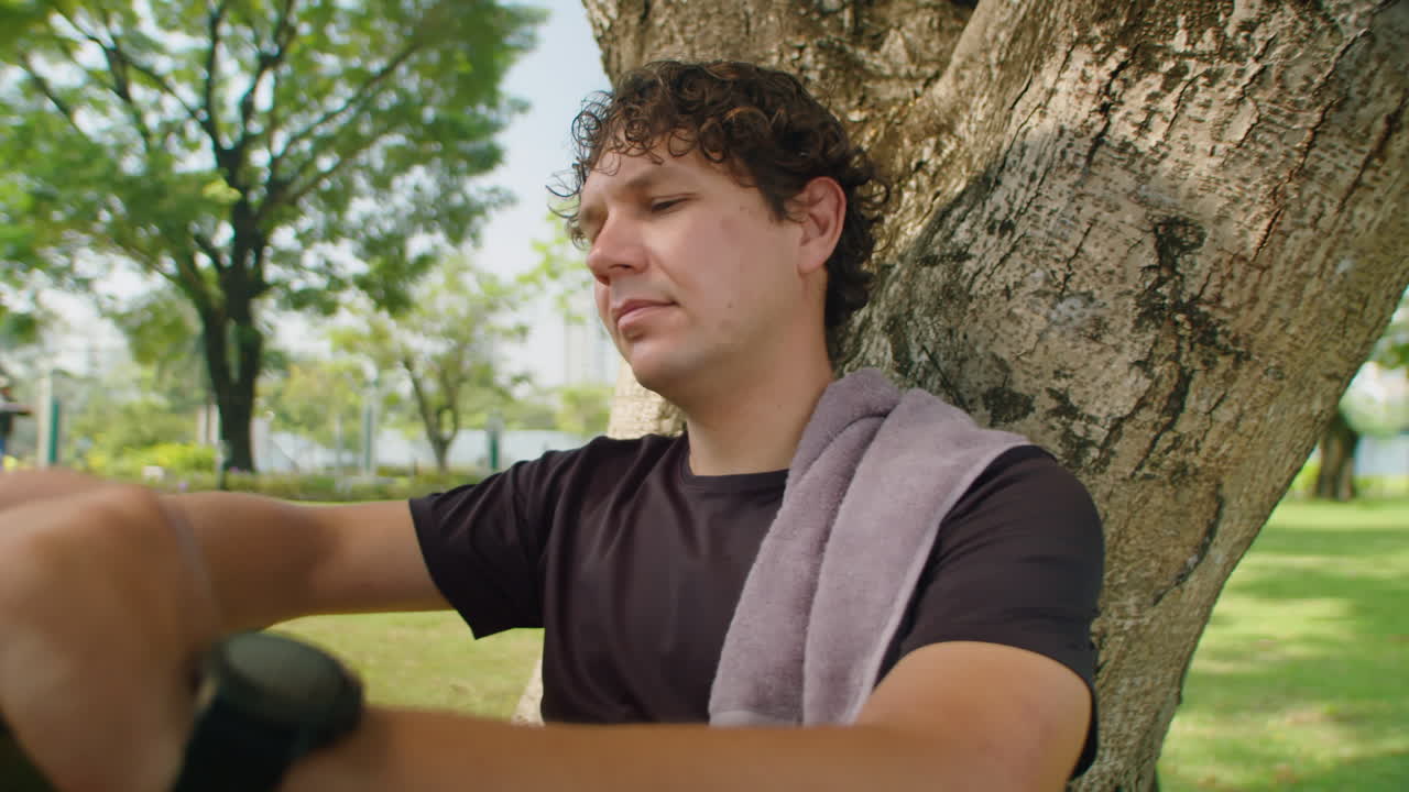 Man Drinking Water after Morning Outdoor Workout