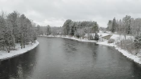 Aerial-shot-from-drone-that-runs-along-river-Piscataquis