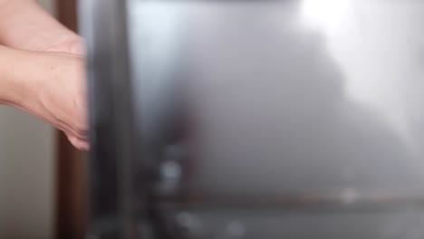 person interacting with a tv