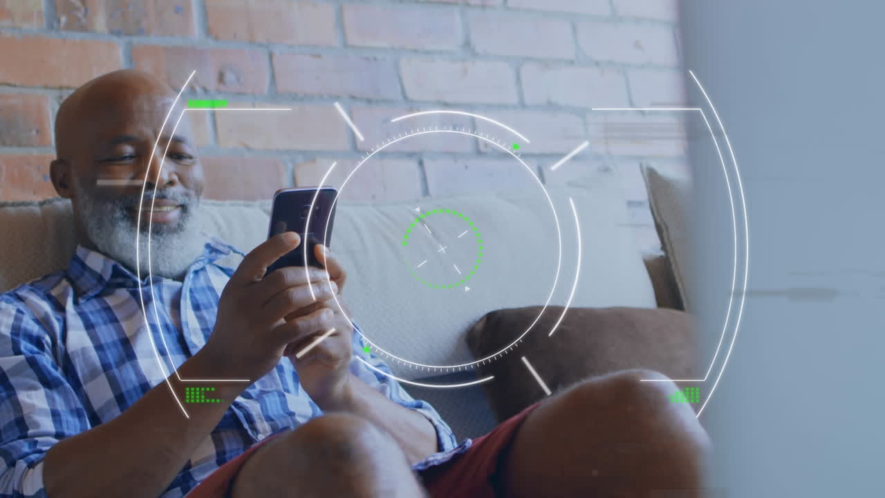 Animation of digital interface over senior man using smartphone