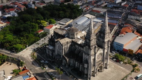 Aerial-view-of-The-Metropolitan-Cathedral-of-Fortaleza-and-the-city-around,-Fortaleza,-Ceara,-Brazil