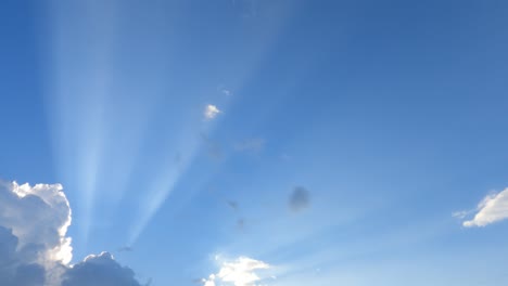 bright sun light ray flare n bokeh sunbeam shined through puffy fluffy white cloud