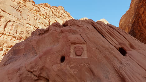 close up tilt up of bas-relief in honor of lawrence of arabia, wadi rum, jordan