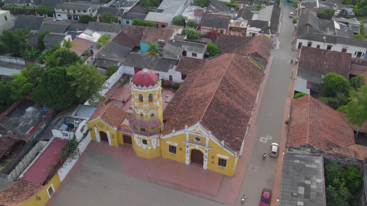 Santa Barbara church, a historical gem, surrounded by lush landscapes and scenic views, is captured in all its majesty. Roll right with yaw left