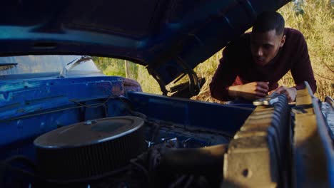 young man on a road trip with a pick-up truck