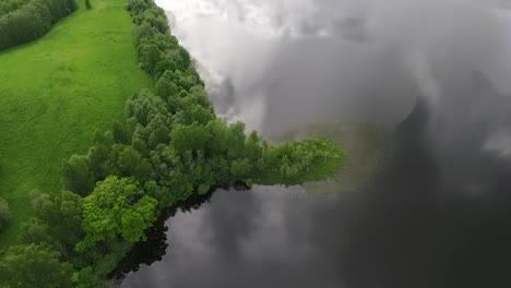 Fisherman-in-the-boat-wide-view-from-above-aerial