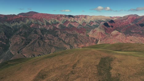 Aerial-revealing-shot-of-the-vibrant-views-at-the-hill-of-14-colors