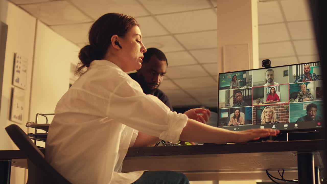 Office worker attending corporate videocall meeting