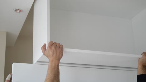 installing a white shelf