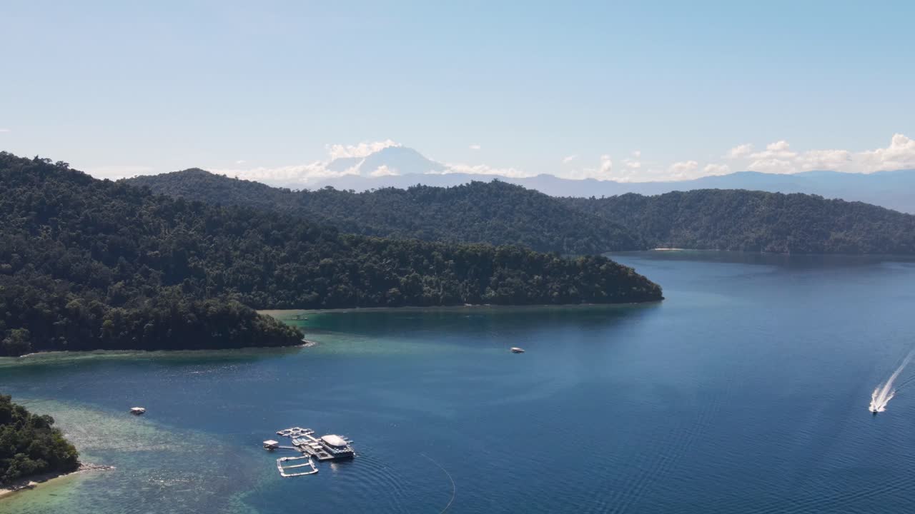 Aerial View Of Gaya Island With Mount Kinabalu In Background