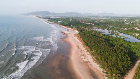 aerial shot of vung tau beach in the morning.