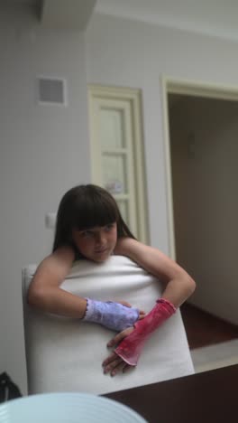 girl with bandaged arms