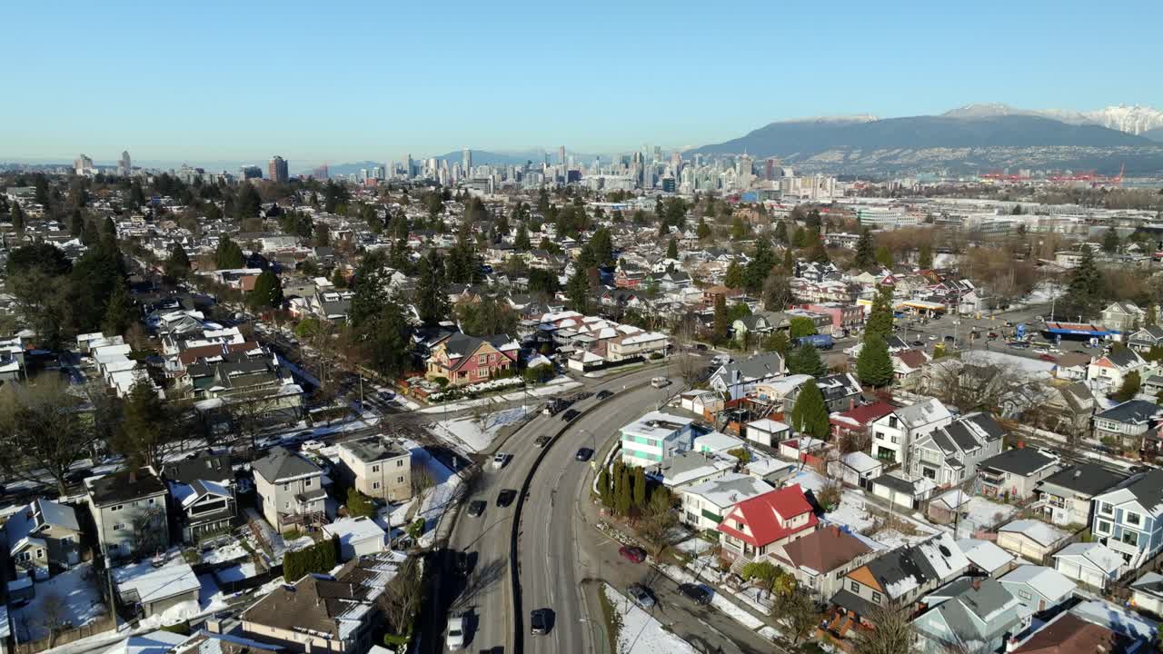 Aerial View Of Knight Street At 14th Avenue With Downtown Vancouver Cityscape In Distance. Vancouver, BC, Canada.