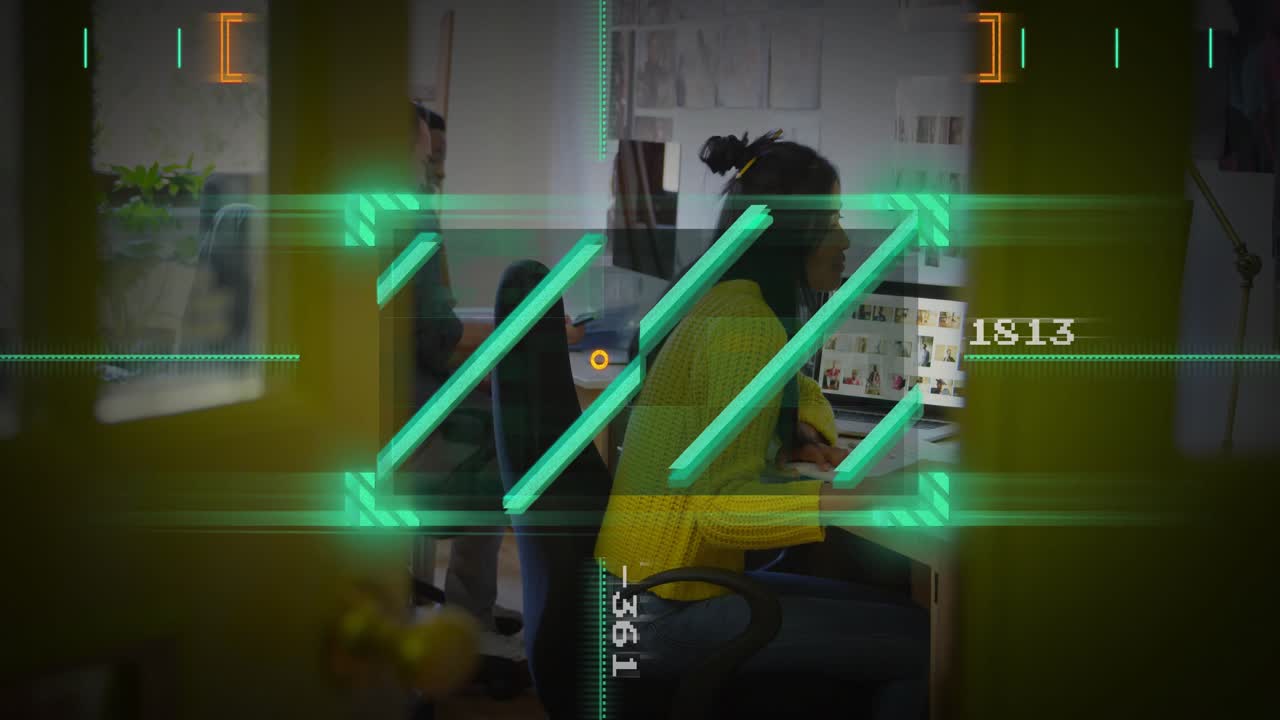 HUD overlay scanning door, revealing designer reviewing thumbnails, coworker passing