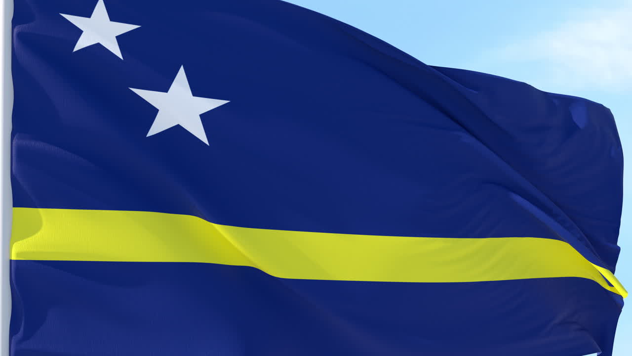 Bandeira de Curaçao Tremulando ao Vento Contra o Céu Azul