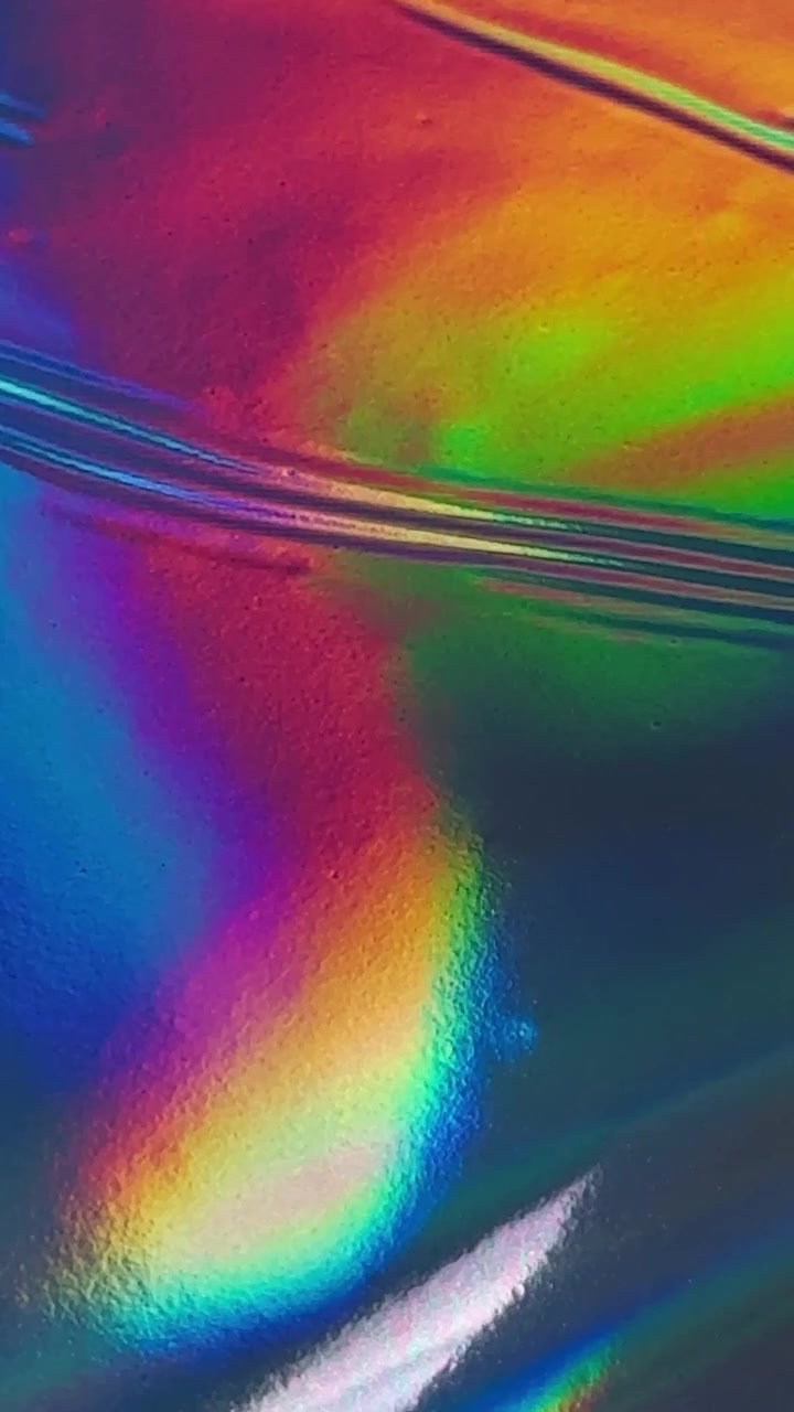 Superficie holográfica abstracta con colores iridiscentes cambiantes