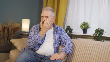 man with wrinkles and problems on his skin is unhappy.