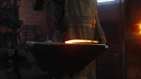 blacksmith working on hot metal