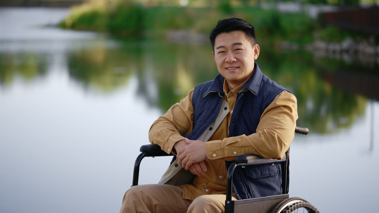 Man in Wheelchair by the Lake