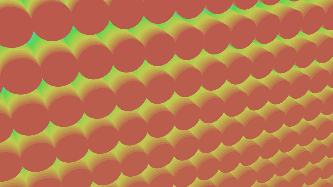 Vivid green and blue circular pattern with varying shades arranged in a repeating motif. Circles overlay each other in a spiral sequence, forming a visually engaging design