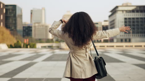 dance, celebration and business woman in a city