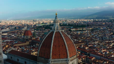 Aerial-orbit-around-dome-of-Florence-Cathedral-at-sunrise