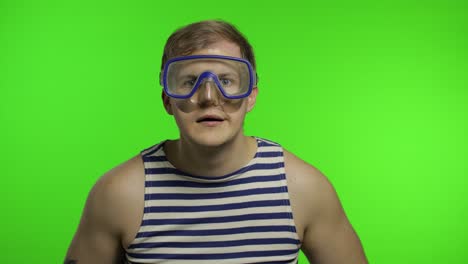 Emotional-man-tourist-in-underwater-mask,-striped-sailor-shirt-on-chroma-key