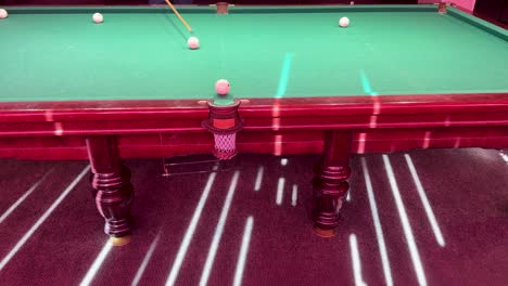 billiard pyramid game table and ball shot in a chisinau, moldova club, showcasing indoor leisure