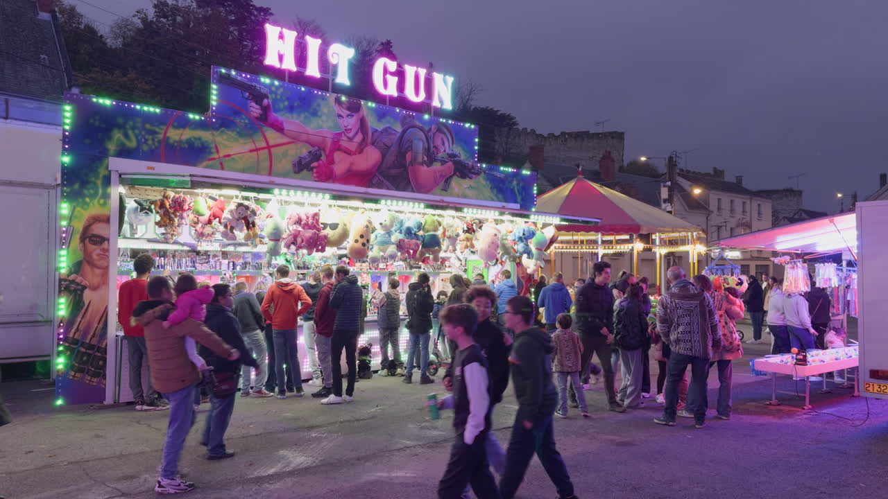 Hit Gun Game at a Night Fair