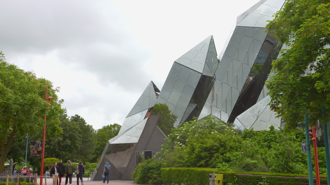 Profile view of unique architecture of buildings in Futuroscope of Poitiers, France.