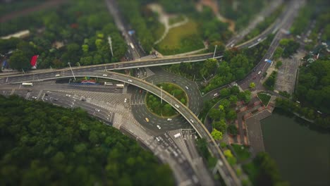 day time wuhan cityscape traffic road junction aerial panorama 4k tilt shift china