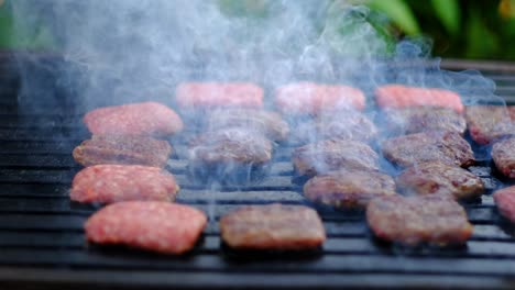 cooked meatballs are turning close up