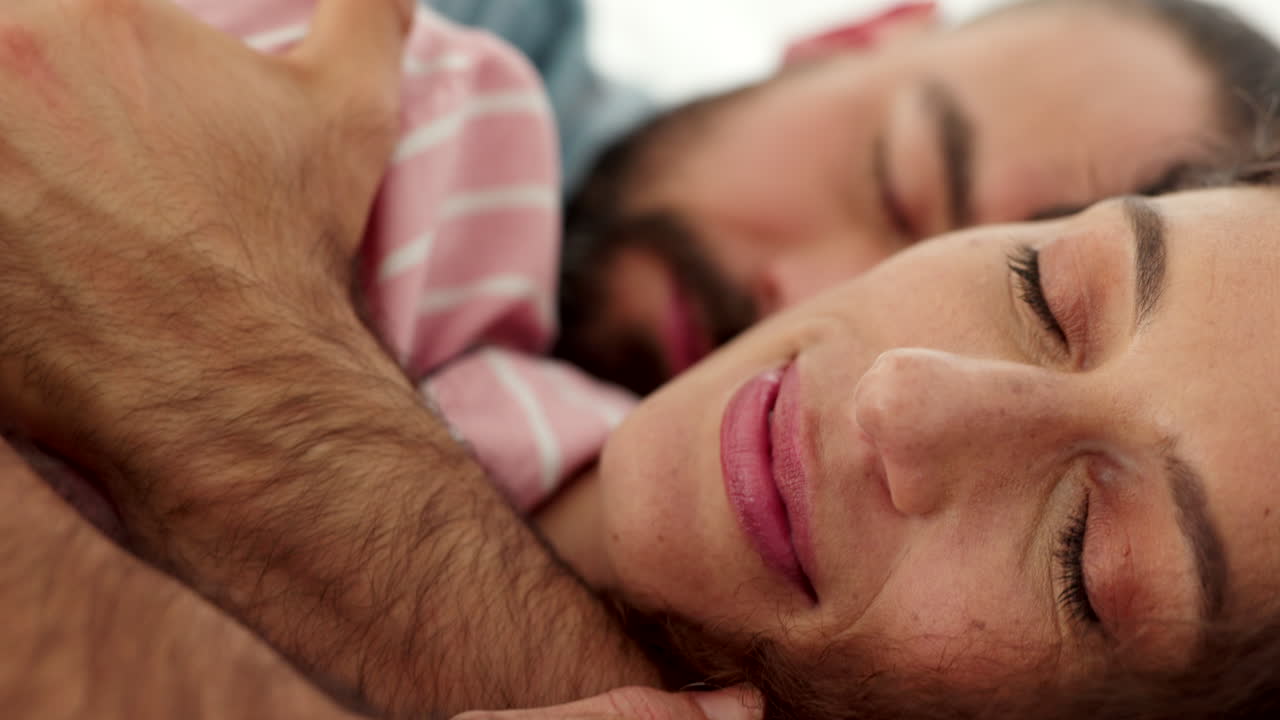 Health, love and couple sleeping